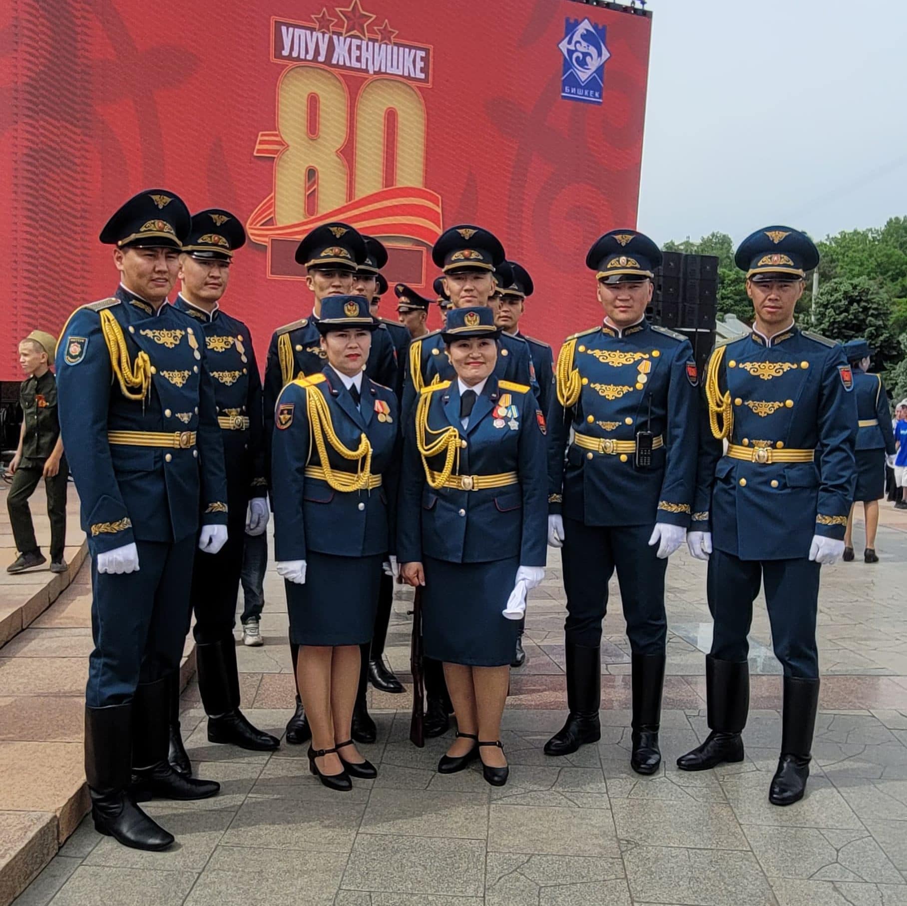 Military officials taking pictures on the 80th anniversary of Victory day
